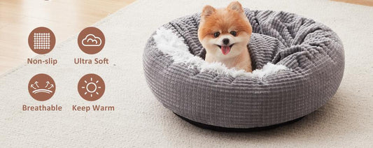 Two plush cave dog beds in light blue and beige, with icons highlighting technical features: Stand-up Top, Plush Material, Elastic Foam, Soft Cushion, Washable, Two Modes, and Anti-slip Bottom.