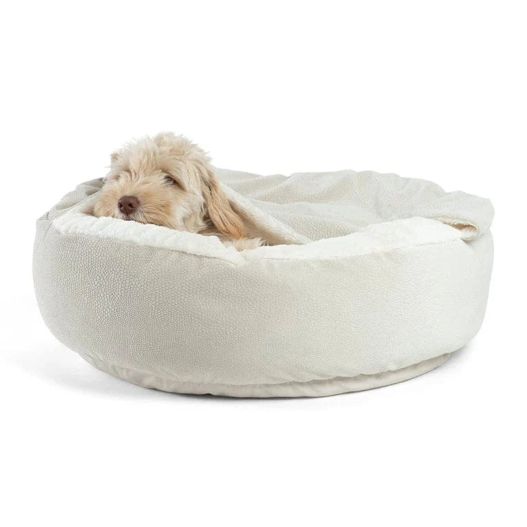 Light cream cozy cave dog bed offering a den-like environment for anxious dogs