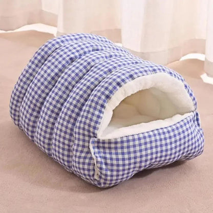 Blue checkered Dogegis™ 2-in-1 Calming Cave bed providing a cozy, self-warming sanctuary for pets