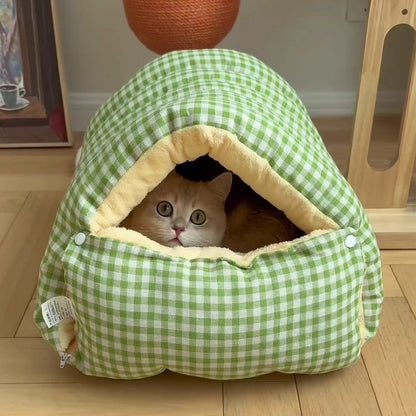 Front view of the green grid Dogegis™ 2-in-1 Calming Cave bed showing the secure den opening