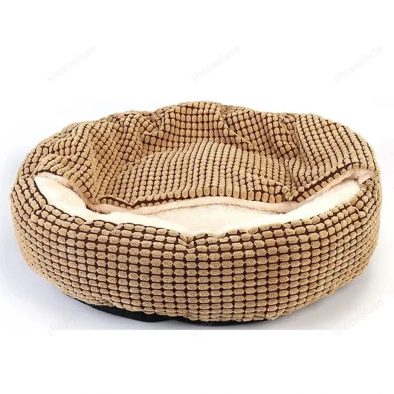 Brown corduroy exterior of the Dogegis™ calming cave bed providing all-season temperature control