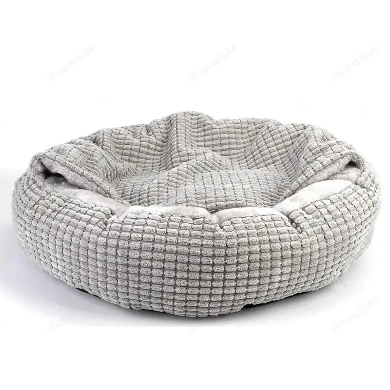 Front view of the grey Dogegis™ self-warming cave bed highlighting its soft plush interior and durable fabric
