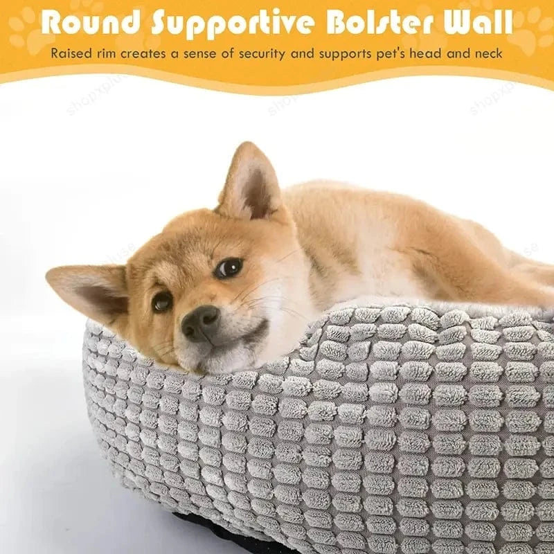 Supportive bolster wall of the Dogegis™ cave bed offering secure head and neck support for resting dogs