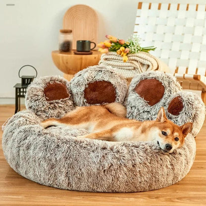 A Shiba Inu resting peacefully on the brown paw-shaped Dogegis™ anxiety-relief dog bed.